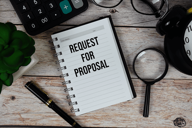 Image of a notebook with Request for Proposal typed on it