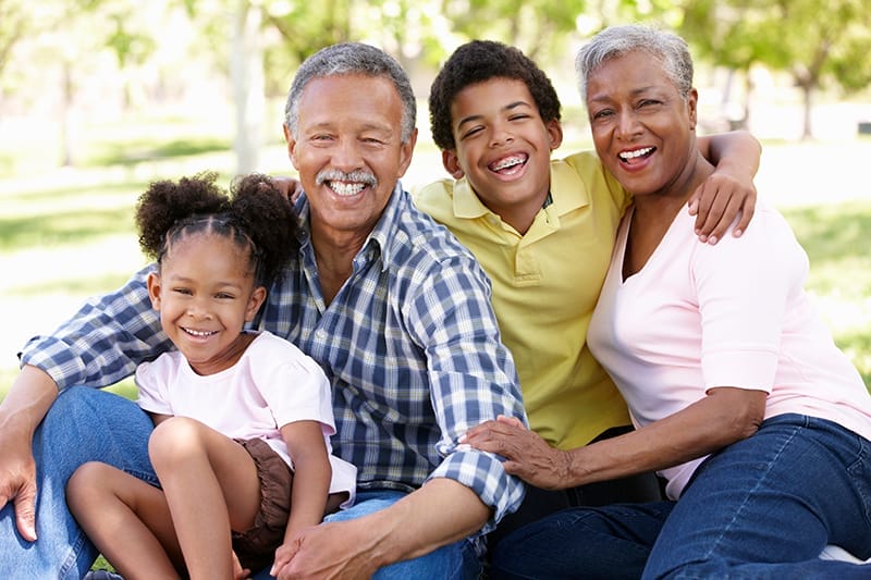 Grandparents and grandchildren in park